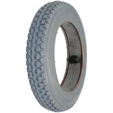 Angled view of the 12 1/2 x 2 1/4 in. (62-203) Primo Power Express Wheelchair Tire shown in gray